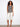 The crew neckline of this top gives it a classic and versatile look, ideal for pairing with various bottoms. By Charlie B.