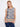 Chic sleeveless top featuring an eye-catching blue motif and crew neckline, enhanced with unique border accents by Charlie B.