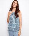 This stylish top features a classic crew neckline, perfect for any casual occasion. The palm leaf pattern adds a tropical touch by Charlie B.