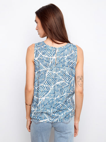 A charming keyhole back detail adds elegance to this versatile top, making it suitable for both casual and dressy events by Charlie B.