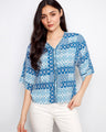 This top features a stylish V-neckline that adds a touch of elegance to any look. Perfect for casual outings or dressy occasions by Charlie B.