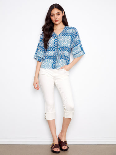 The wide elbow sleeves on this top provide a comfortable and chic fit, making it ideal for layering or wearing on its own by Charlie B.