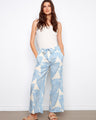 Cropped wide-leg pants with a self-tie belt and elegant abstract pattern, perfect for casual outings by Charlie B.