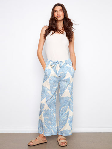 Stylish cropped length pants with an eye-catching pattern and comfortable fit, complete with a self-tie belt by Charlie B.