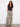 Stylish pants featuring a wide leg design with a chic self-tie belt for added elegance by Charlie B.