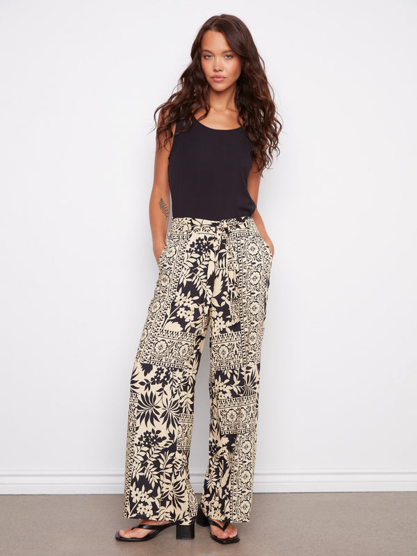 Stylish pants featuring a wide leg design with a chic self-tie belt for added elegance by Charlie B.
