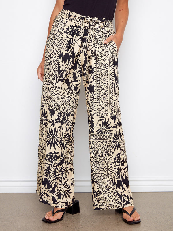 These pants boast a cropped length, perfect for showcasing your favorite footwear by Charlie B.