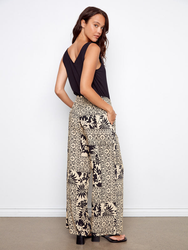 The self-tie belt adds a touch of sophistication to these wide legged, cropped trousers by Charlie B.
