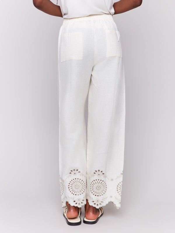 Linen pants showcasing drawstrings on waistband by Charlie B.