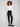Black pants featuring a skinny fit and styled with a white top, highlighting the elastic waistband by Charlie B.