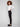 Elegant black pull-on pants styled with a white top, emphasizing the slit detail at the hem by Charlie B.
