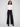 Black pants with a flattering wide-leg silhouette, offering both comfort and style for versatile wear, by Charlie B.