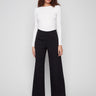 Black pants with a flattering wide-leg silhouette, offering both comfort and style for versatile wear, by Charlie B.