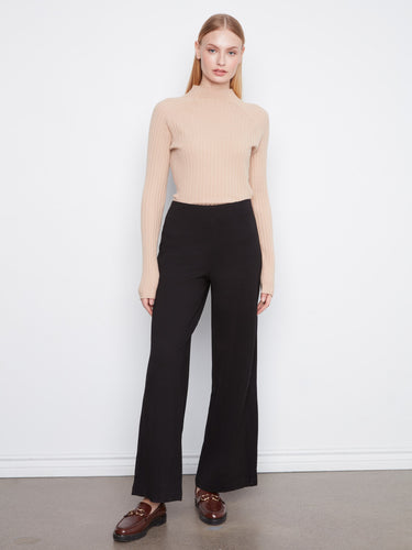 Elegant wide leg pants featuring a pull-on design for effortless style and comfort. Crafted for versatility by Charlie B.