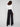 Designed with a mid-rise waist, these black pants provide a classic look that complements various tops effortlessly, by Charlie B.