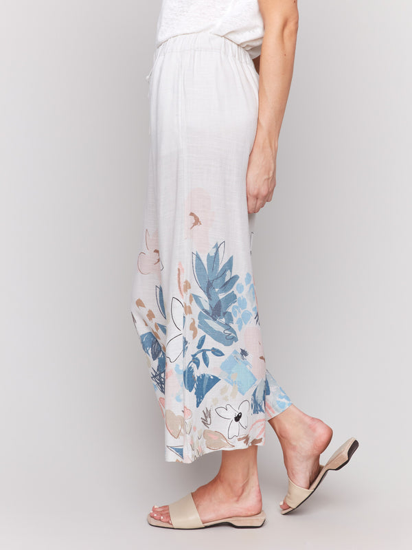 Regular rise linen pants with in-seam pockets and a lively border pattern by Charlie B.