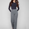Black pull-on pants featuring a stylish wide-leg design and front dart detailing by Charlie B.