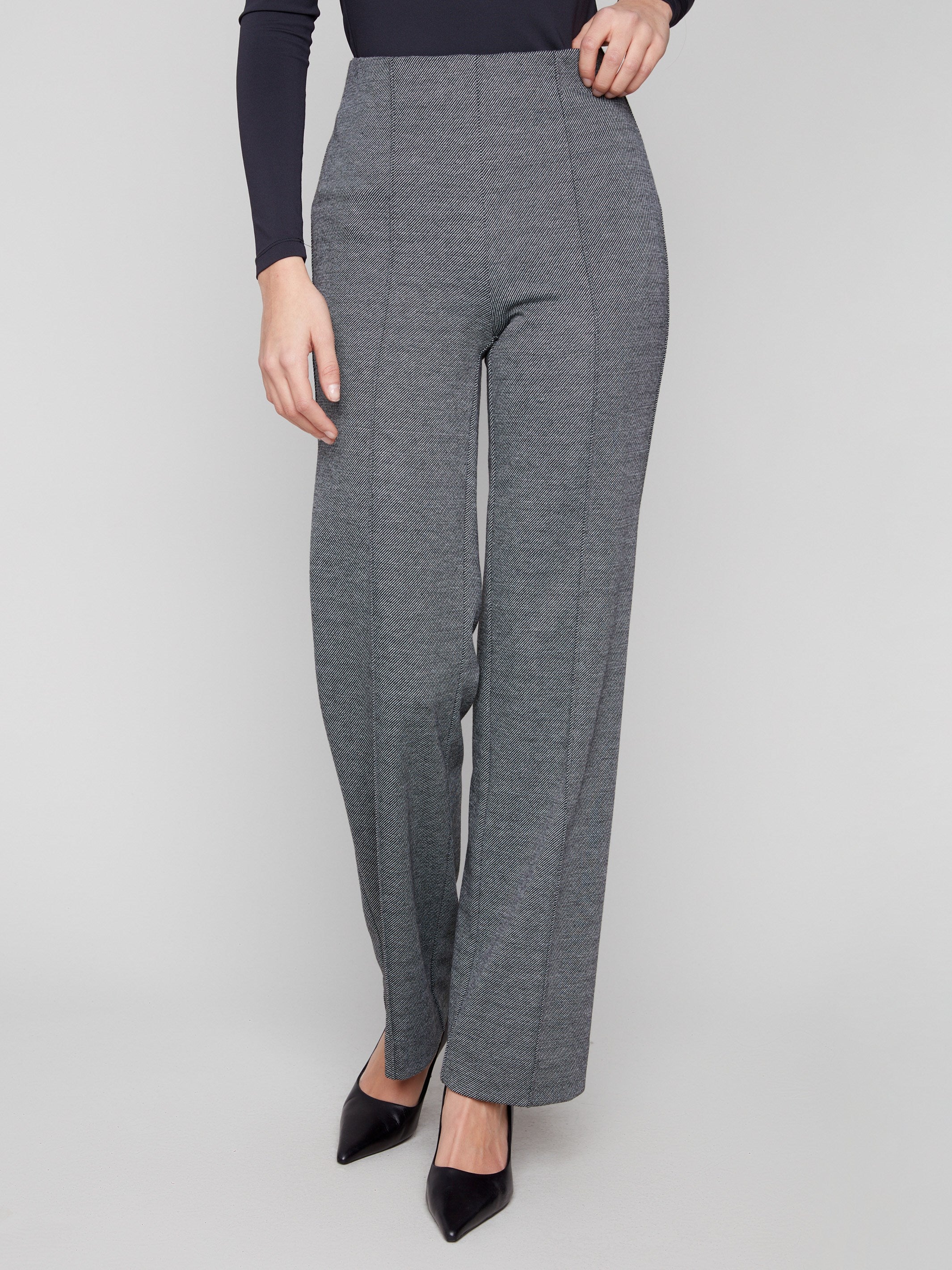 Elegant black pants with an elastic waist and stretch twill fabric for comfort by Charlie B.