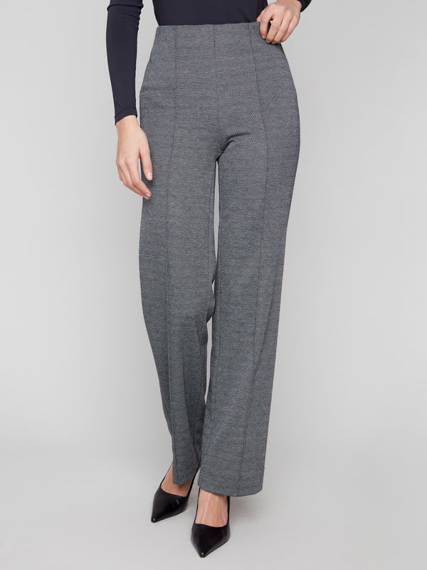 Elegant black pants with an elastic waist and stretch twill fabric for comfort by Charlie B.