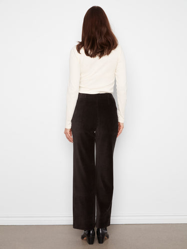 Designed with a regular rise, these pants provide a flattering fit that complements any top by Charlie B.