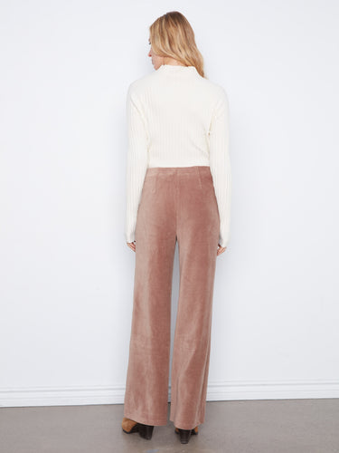 Stylish taupe wide-leg pants in stretch corduroy fabric, matched with a white ribbed sweater by Charlie B.