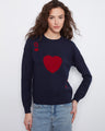 Navy sweater featuring a striking jacquard heart design, perfect for adding a playful touch to any outfit by Charlie B.