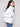 Almond quilted jacket with snap buttons at the hem, perfect for layering in cooler weather by Charlie B.