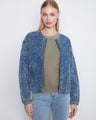 This denim jacket offers a seamless blend of floral embroidery on soft Tencel fabric for everyday wear by Charlie B.