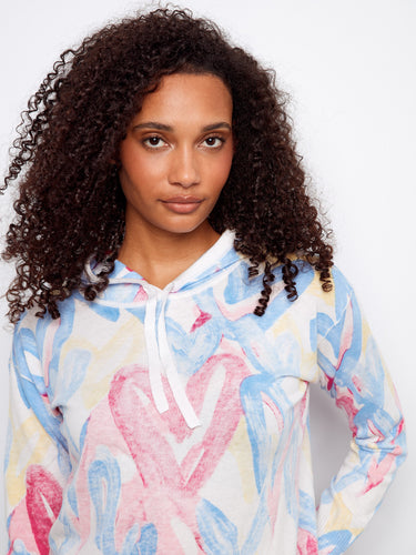 Soft and stylish hoodie made from 100% cotton, ensuring breathability and ease throughout the day. Designed by Charlie B.