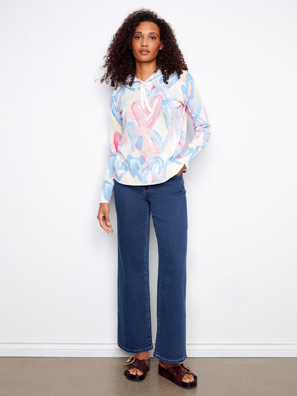 Experience the ultimate casual look with this colorful hoodie, perfect for layering in any season. Fashioned by Charlie B.