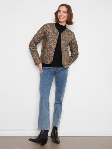 Versatile reversible jacket featuring edge binding detail that adds a touch of elegance to your outfit. By Charlie B.