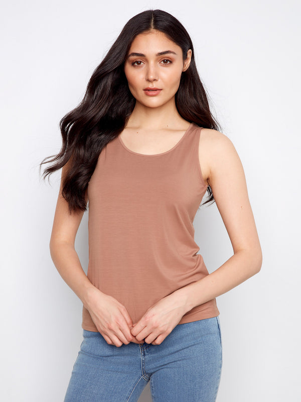 Elegant brown tank top designed with reversible features, allowing multiple looks in one piece by Charlie B.