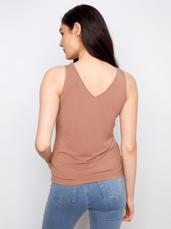 Versatile brown tank highlighting the scoop neck style, creating a simple yet stylish appearance by Charlie B.