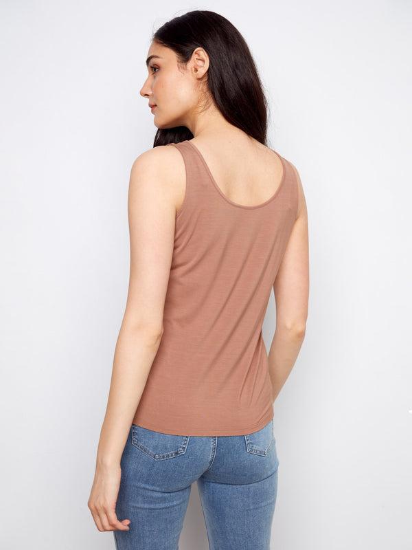 With its V-neck style, this piece adds an element of sophistication to any outfit while maintaining ultimate comfort and ease. By Charlie B.