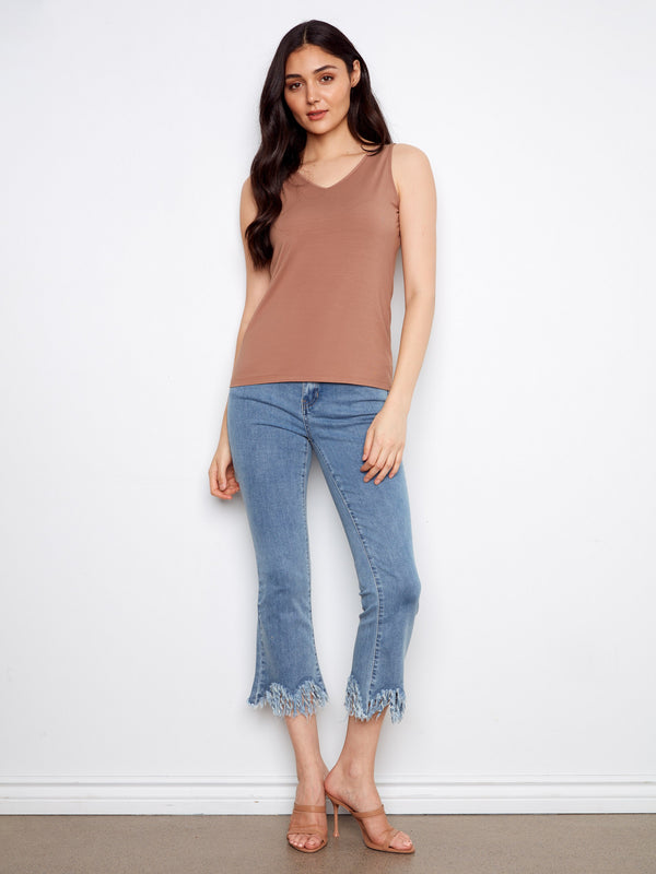 A relaxed fit ensures maximum comfort without sacrificing style, making it an essential addition to your clothing collection by Charlie B.