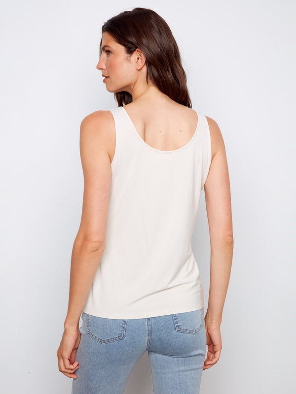 Feel great in this scoop neck top that combines fashion with function, perfect for everyday wear. By Charlie B.