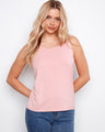 This top features a reversible design, offering versatile style options. The relaxed fit ensures comfort in every wear by Charlie B.