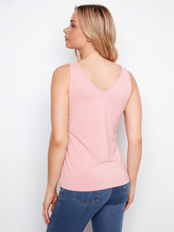 Relaxed fit enhances the comfort of this chic top, making it a wardrobe staple for any season by Charlie B.