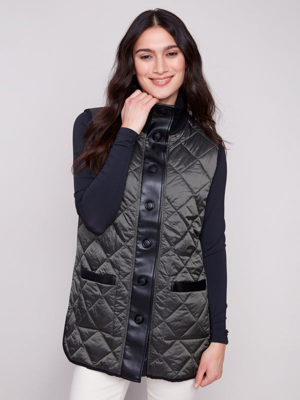 Stylish spruce vest with reversible design, offering both functionality and fashion-forward appeal by Charlie B.