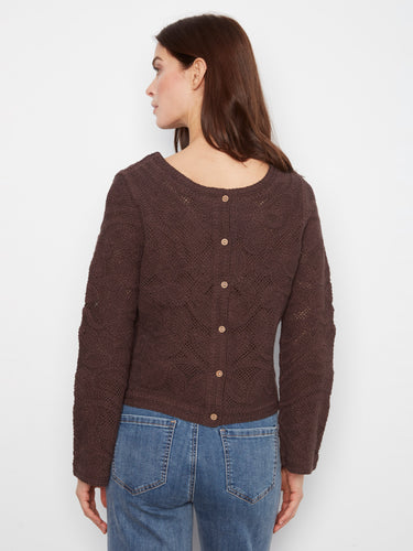 The button-down back option provides unique styling versatility in this comfortable knitwear by Charlie B.