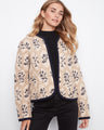 Open front jacket with intricate floral patterns, perfect for layering over casual outfits. Designed by Charlie B.