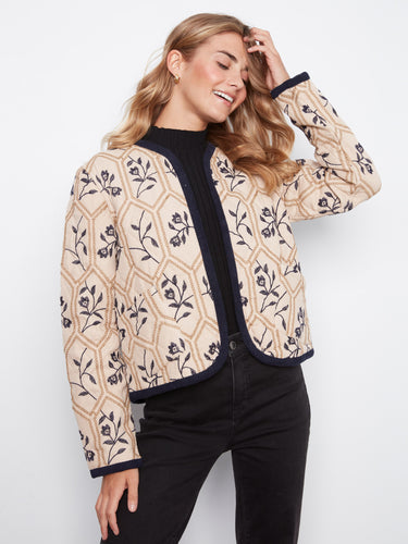 Elegant open front jacket with patch pockets, combining functionality and style seamlessly. Designed by Charlie B.