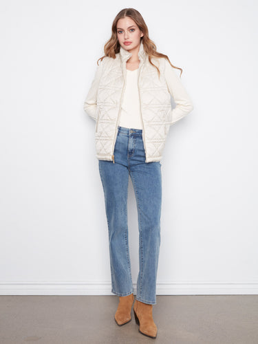 Faux fur side of the reversible quilted vest adds a touch of warmth and luxury by Charlie B.