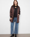 Quilted jacket featuring a stylish stand collar and sleek design, perfect for a chic look by Charlie B.