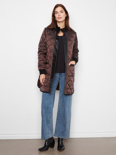 Quilted jacket featuring a stylish stand collar and sleek design, perfect for a chic look by Charlie B.