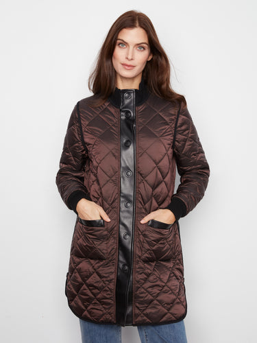 Featuring a practical snap-button closure, this jacket combines functionality with style by Charlie B.