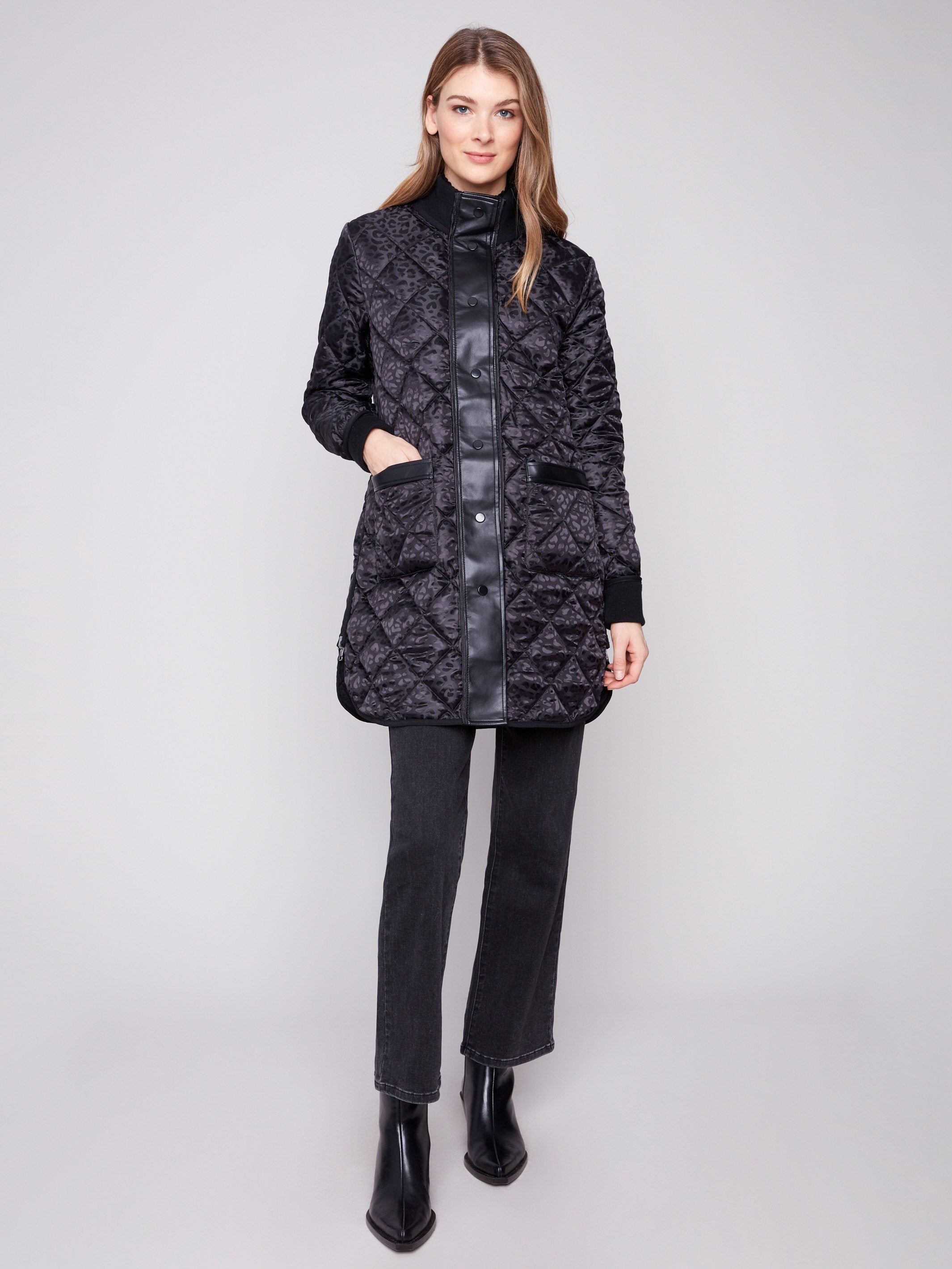 Black quilted puffer jacket with rib knit detailing and two front patch pockets, perfect for a stylish look by Charlie B.