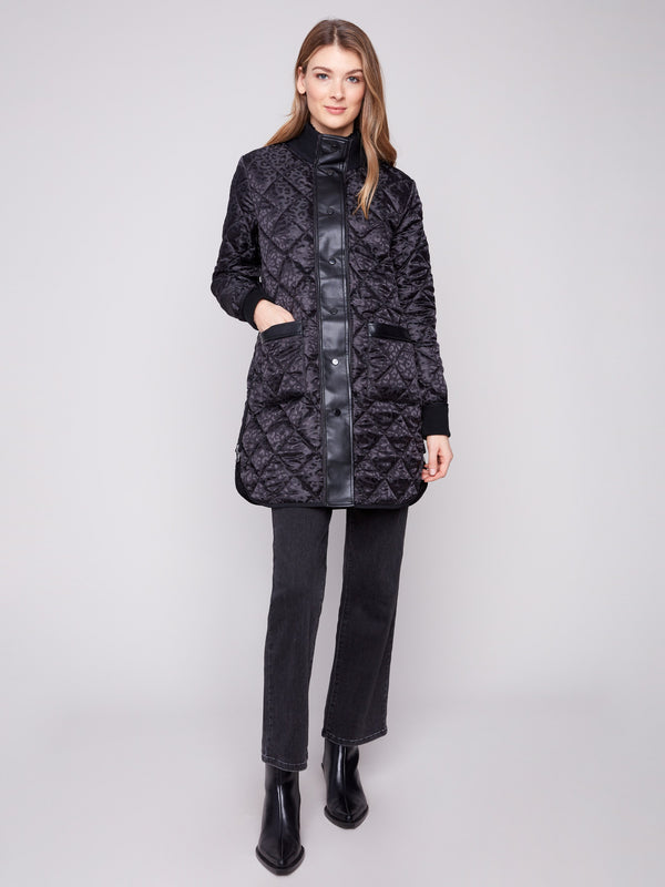 Black quilted puffer jacket with rib knit detailing and two front patch pockets, perfect for a stylish look by Charlie B.