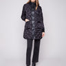 Black quilted puffer jacket with rib knit detailing and two front patch pockets, perfect for a stylish look by Charlie B.