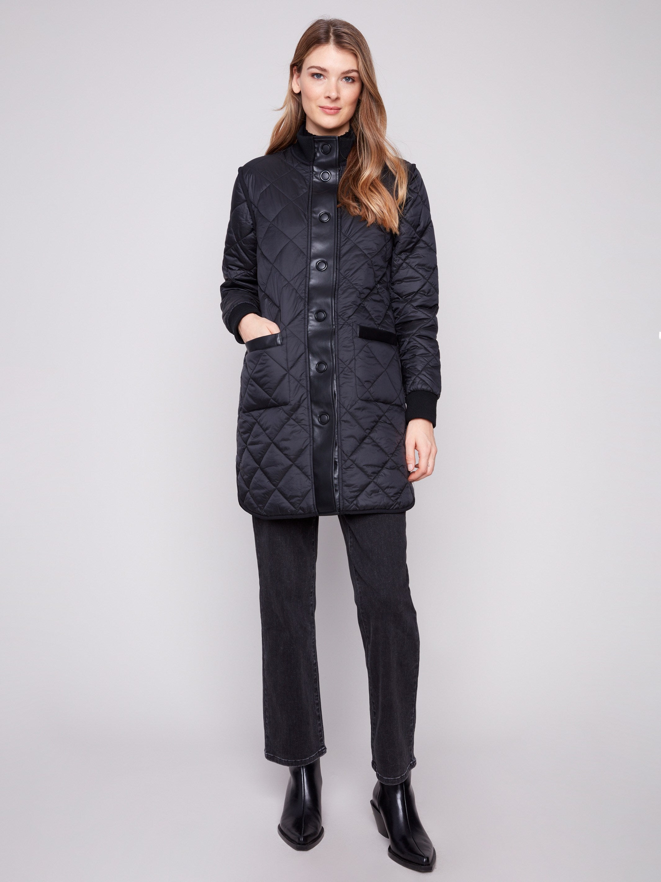 Elegant black puffer jacket featuring faux leather detailing and snap buttons for added sophistication by Charlie B.